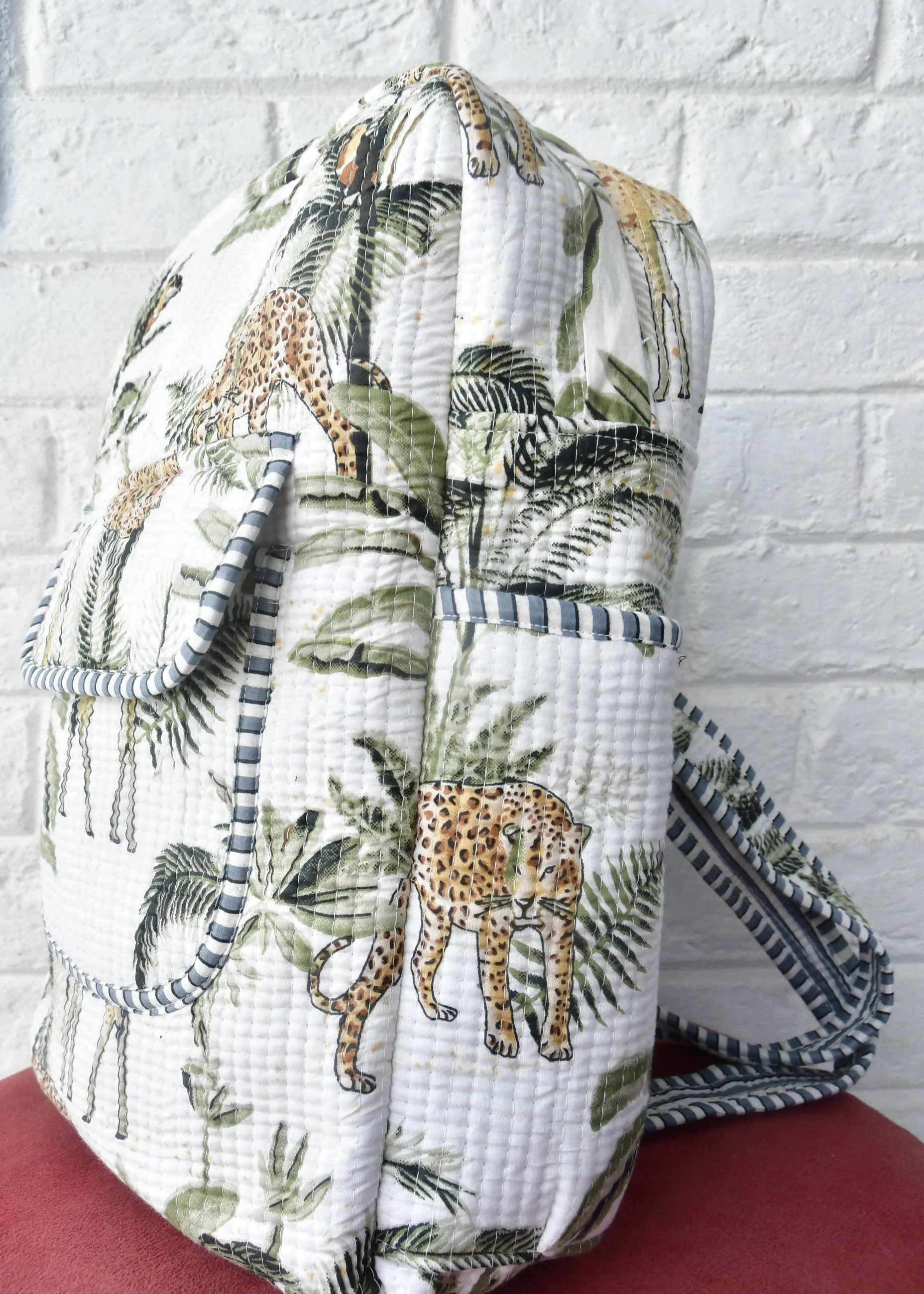 White Leopard In Jungle Print Backpack